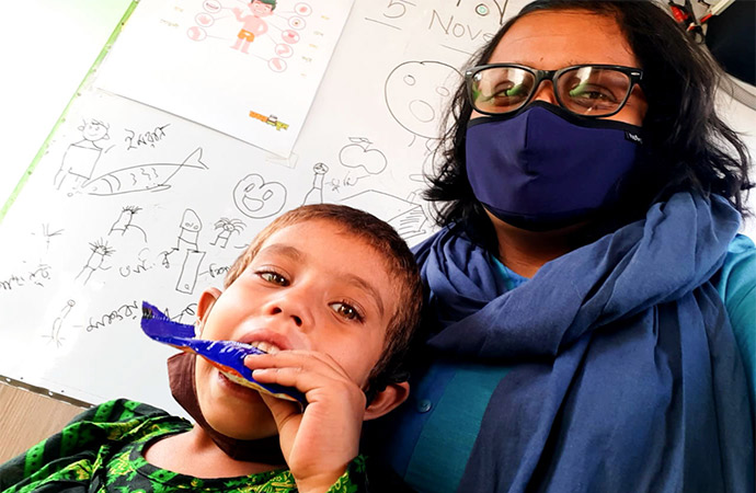 Chakar School Student with her Teacher